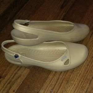 Women's 6.5/7 Crocs gold ballet flats sling back